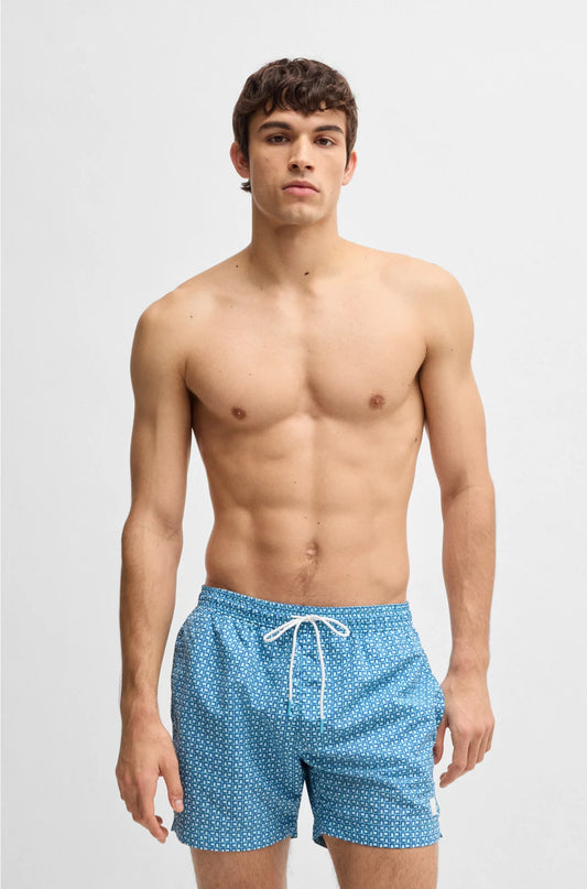 PRINTED SWIM SHORTS WITH LOGO BADGE
